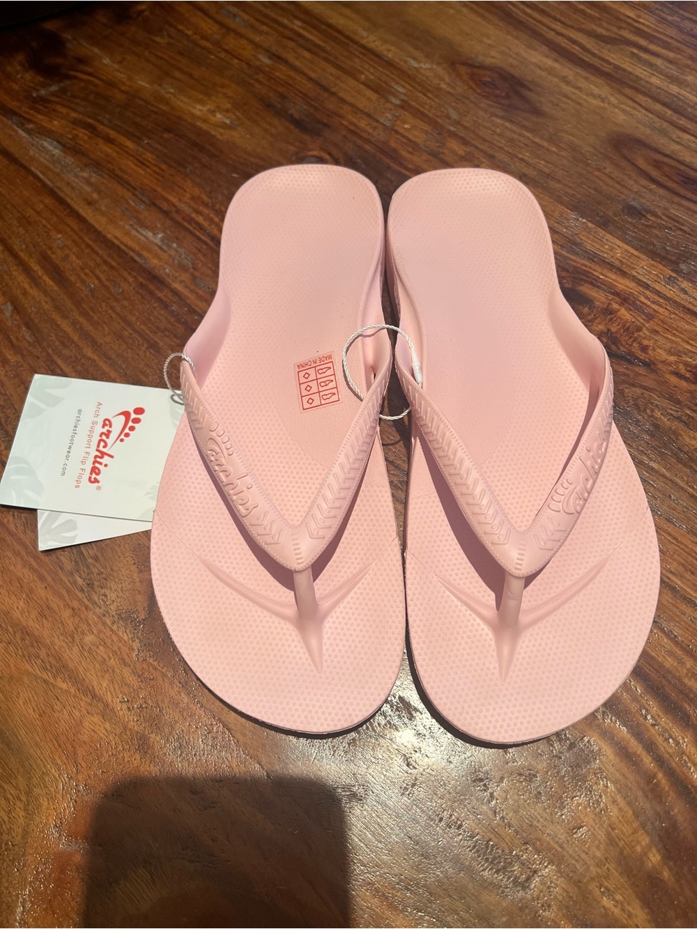 Archie’s  Women's Slim Flip Flops - Light Pink